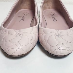 Sweet pink Chanel flats.